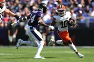 BALTIMORE, MARYLAND - SEPTEMBER 14: Quinshon Judkins #10 of the Cleveland Browns runs the ball against Marlon Humphrey #44 of the Baltimore Ravens during the game at M&T Bank Stadium on September 14, 2025 in Baltimore, Maryland.