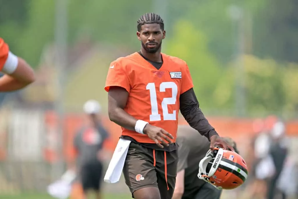 BEREA, OHIO - JUNE 12: Quarterback Shedeur Sanders #12 of the Cleveland Browns watches practice during organized team activities at CrossCountry Mortgage Campus on June 12, 2025 in Berea, Ohio.