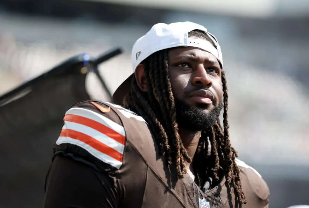 PHILADELPHIA, PENNSYLVANIA - AUGUST 16: Alex Wright #91 of the Cleveland Browns looks on from the bench during the NFL Preseason 2025 game between Cleveland Browns and Philadelphia Eagles at Lincoln Financial Field on August 16, 2025 in Philadelphia, Pennsylvania. The Cleveland Browns defeated the Philadelphia Eagles 22-13.