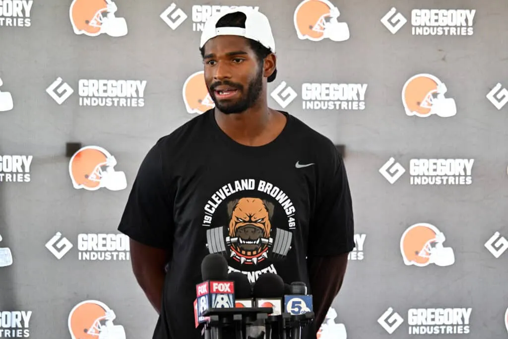 BEREA, OHIO - JULY 25: Quarterback Shedeur Sanders #12 of the Cleveland Browns talks to reporters during training camp at CrossCountry Mortgage Campus on July 25, 2025 in Berea, Ohio.
