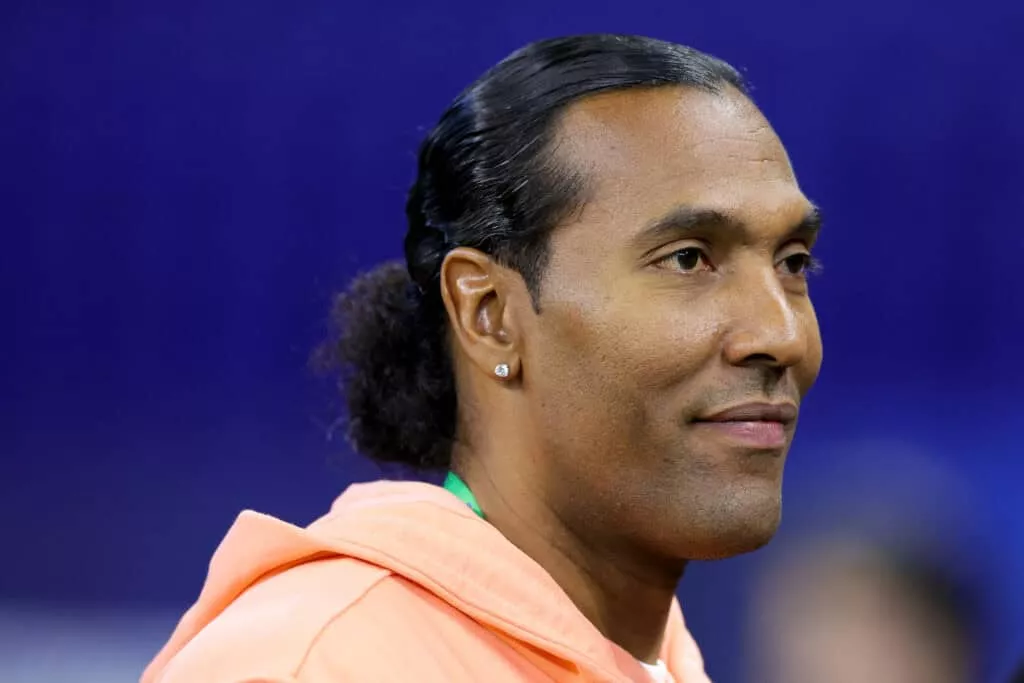 INDIANAPOLIS, INDIANA - MARCH 04: Former NFL player T.J. Houshmandzadeh looks on during the NFL Combine at Lucas Oil Stadium on March 04, 2023 in Indianapolis, Indiana.