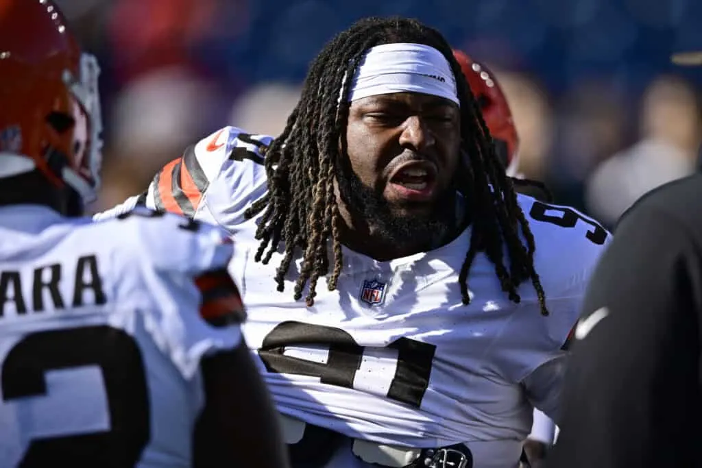 FOXBOROUGH, MASSACHUSETTS - OCTOBER 26: Alex Wright #91 of the Cleveland Browns looks on during warmups the game against the New England Patriots at Gillette Stadium on October 26, 2025 in Foxborough, Massachusetts.