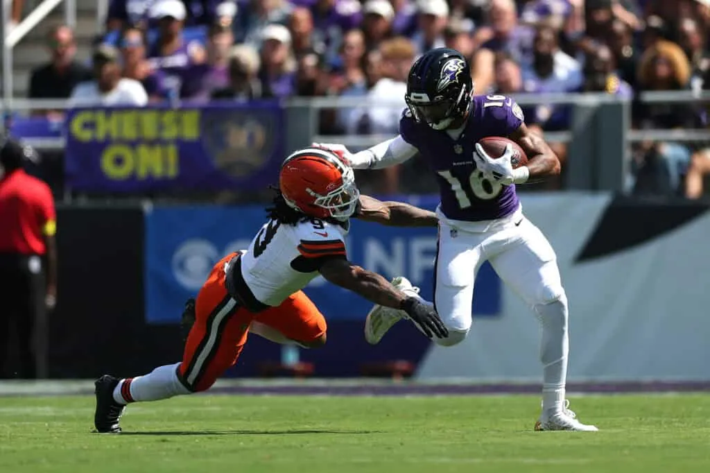 BALTIMORE, MARYLAND - SEPTEMBER 14: Tylan Wallace #16 of the Baltimore Ravens is tackled by Grant Delpit #9 of the Cleveland Browns during the game at M&T Bank Stadium on September 14, 2025 in Baltimore, Maryland.