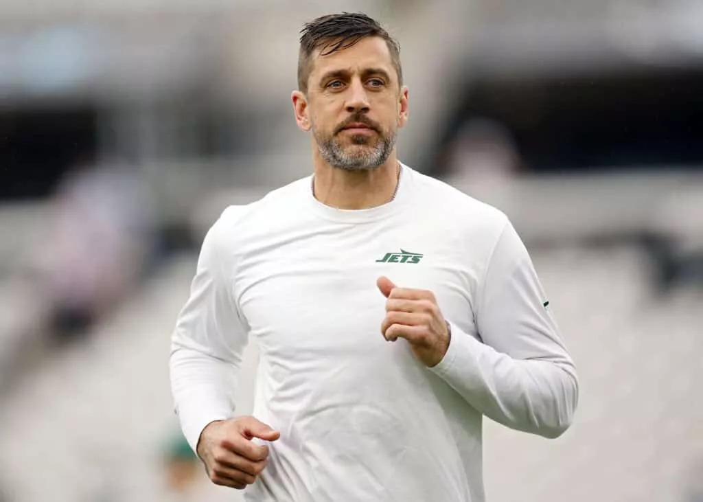 JACKSONVILLE, FLORIDA - DECEMBER 15: Aaron Rodgers #8 of the New York Jets warms up before the game against the Jacksonville Jaguars at EverBank Stadium on December 15, 2024 in Jacksonville, Florida.