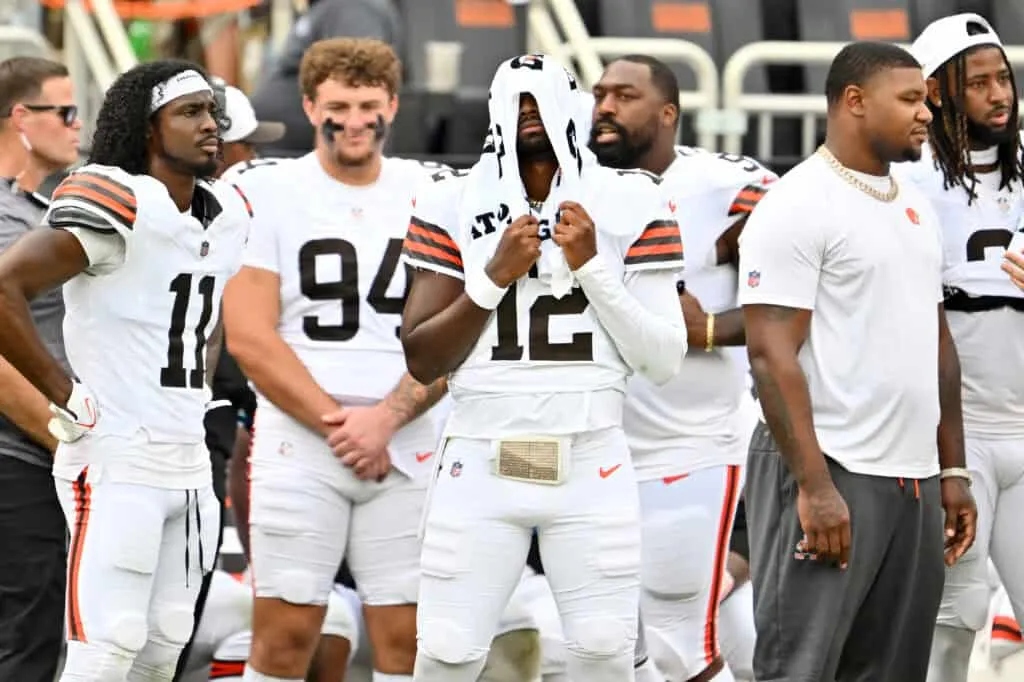 CLEVELAND, OHIO - AUGUST 23: Quarterback Shedeur Sanders #12 of the Cleveland Browns reacts after leaving the game during the fourth quarter of an NFL Preseason 2025 game against the Los Angeles Rams at Huntington Bank Field on August 23, 2025 in Cleveland, Ohio. The Browns defeated the Rams 19-17.