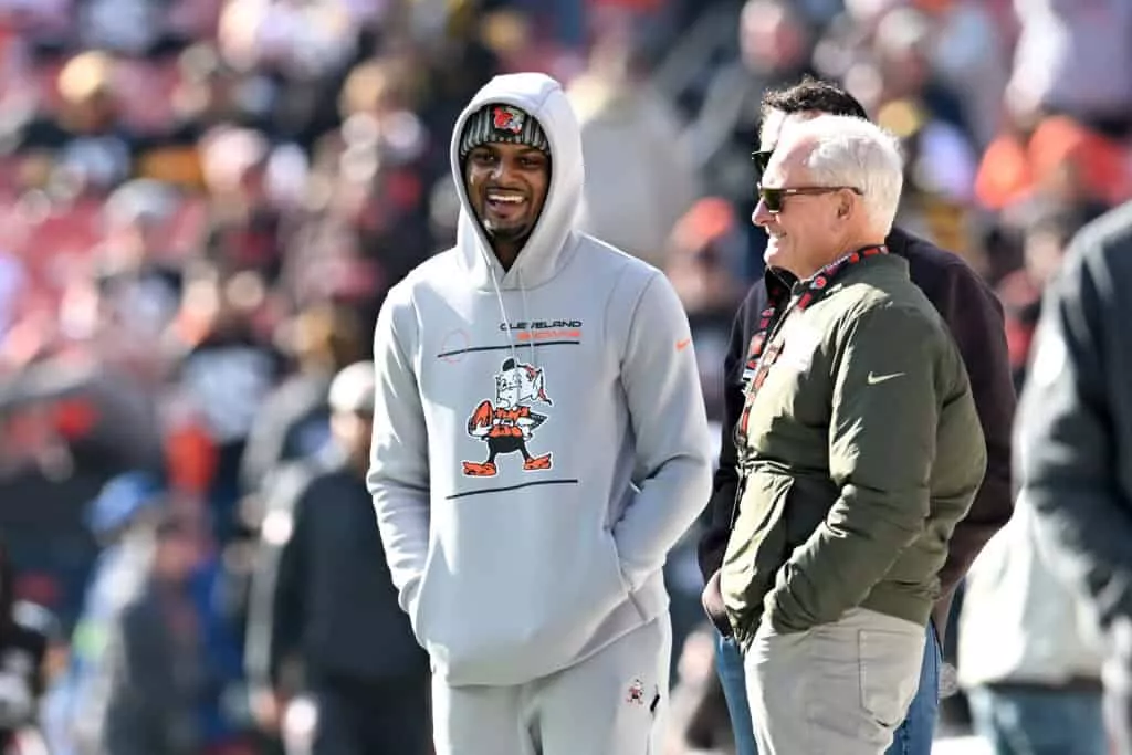CLEVELAND, OHIO - NOVEMBER 19: Deshaun Watson #4 of the Cleveland Browns meets with owner Jimmy Haslam before the game against the Pittsburgh Steelers at Cleveland Browns Stadium on November 19, 2023 in Cleveland, Ohio.