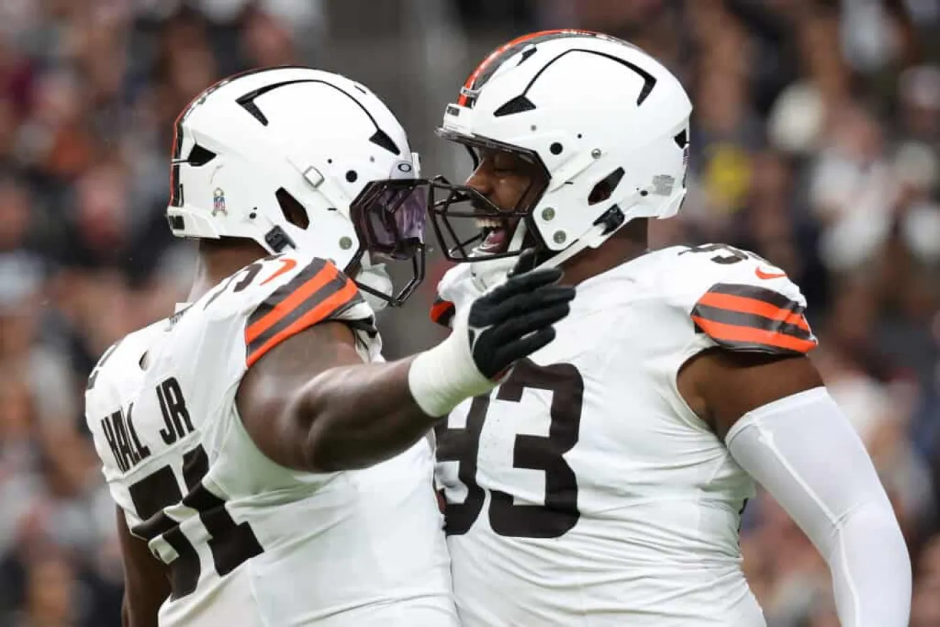 LAS VEGAS, NEVADA - NOVEMBER 23: Mike Hall Jr. #51 and Shelby Harris #93 of the Cleveland Browns celebrate a sack during the first quarter against the Las Vegas Raiders at Allegiant Stadium on November 23, 2025 in Las Vegas, Nevada.