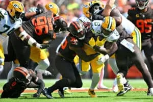 CLEVELAND, OHIO - SEPTEMBER 21: Josh Jacobs #8 of the Green Bay Packers runs the ball during the first quarter against the Cleveland Browns at Huntington Bank Field on September 21, 2025 in Cleveland, Ohio.