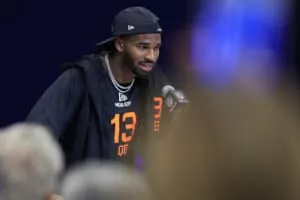 INDIANAPOLIS, INDIANA - FEBRUARY 28: Shedeur Sanders #QB13 of Colorado speaks to the media during the 2025 NFL Scouting Combine at Lucas Oil Stadium on February 28, 2025 in Indianapolis, Indiana.