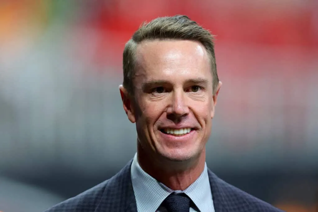 ATLANTA, GEORGIA - OCTOBER 03: Former quarterback Matt Ryan smiles prior to the game between the Tampa Bay Buccaneers and the Atlanta Falcons at Mercedes-Benz Stadium on October 03, 2024 in Atlanta, Georgia.