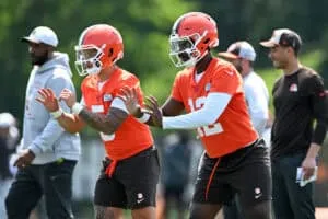 BEREA, OHIO - JUNE 11: Shedeur Sanders #12 and Dillon Gabriel #5 of the Cleveland Browns run a drill during Cleveland Browns mandatory minicamp at CrossCountry Mortgage Campus on June 11, 2025 in Berea, Ohio.