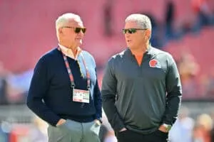 CLEVELAND, OHIO - SEPTEMBER 07: Jimmy Haslam, co-owner of the Cleveland Browns, speaks with defensive coordinator Jim Schwartz prior to the game against the Cincinnati Bengals during the game at Huntington Bank Field on September 07, 2025 in Cleveland, Ohio.