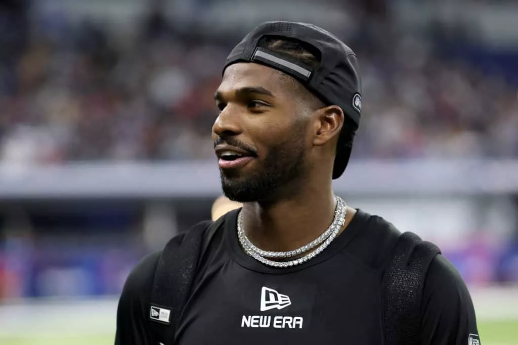 INDIANAPOLIS, INDIANA - MARCH 01: Shedeur Sanders #QB13 of Colorado looks on during the NFL Scouting Combine at Lucas Oil Stadium on March 01, 2025 in Indianapolis, Indiana.