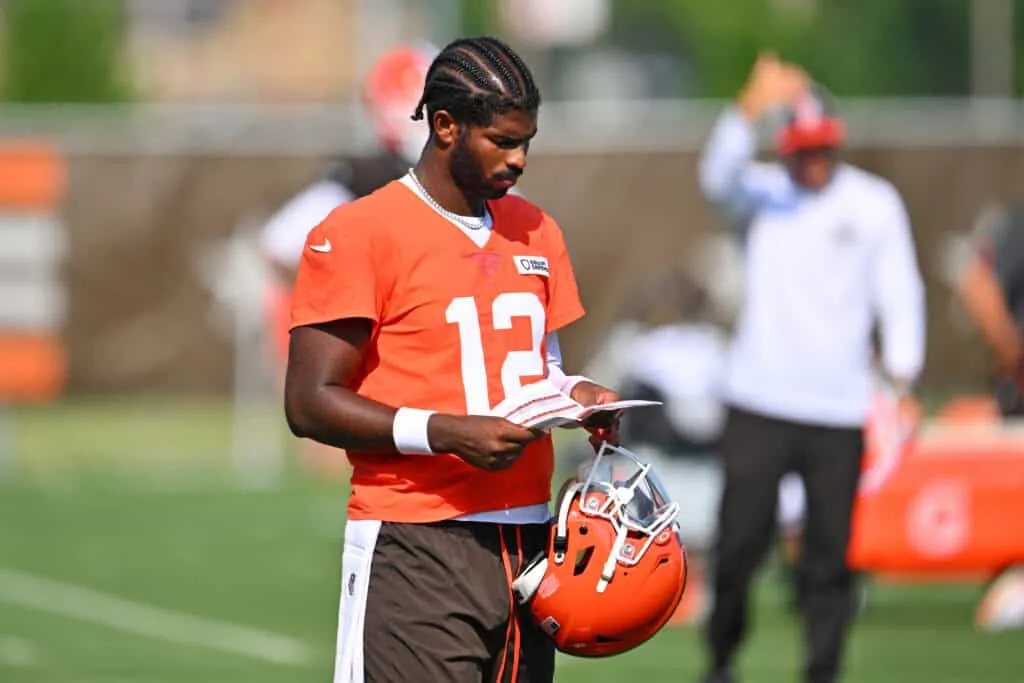 BEREA, OHIO - JULY 26: Quarterback Shedeur Sanders #12 of the Cleveland Browns reviews plays during training camp at CrossCountry Mortgage Campus on July 26, 2025 in Berea, Ohio.