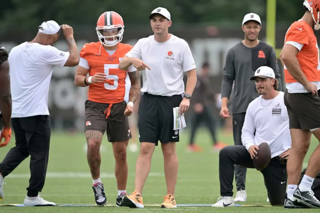 BEREA, OHIO - JULY 25: Offensive coordinator Tommy Rees works with quarterback Dillon Gabriel #5 of the Cleveland Browns during training camp at CrossCountry Mortgage Campus on July 25, 2025 in Berea, Ohio.