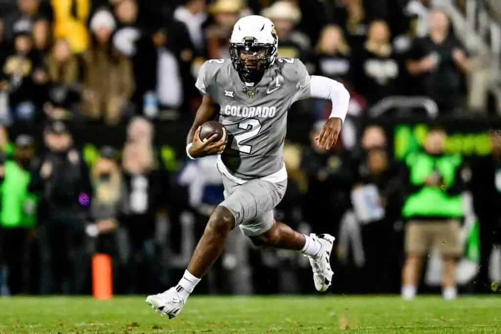 BOULDER, CO - OCTOBER 26: Shedeur Sanders #2 of the Colorado Buffaloes carries the ball in the first quarter against the Cincinnati Bearcats at Folsom Field on October 26, 2024 in Boulder, Colorado.