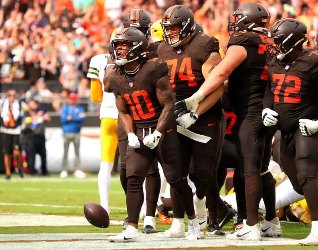 CLEVELAND, OHIO - SEPTEMBER 21: Quinshon Judkins #10 of the Cleveland Browns celebrates with teammates after scoring a touchdown against the Green Bay Packers during the fourth quarter at Huntington Bank Field on September 21, 2025 in Cleveland, Ohio.