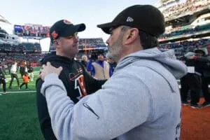 CINCINNATI, OHIO - DECEMBER 22: Head coach Zac Taylor of the Cincinnati Bengals and head coach Kevin Stefanski of the Cleveland Browns meet on the field following the Bengals 24-6 win at Paycor Stadium on December 22, 2024 in Cincinnati, Ohio.