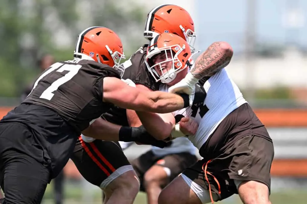 BEREA, OHIO - JUNE 04: Mason Graham #94 of the Cleveland Browns rushes against Wyatt Teller #77 during Cleveland Browns OTA offseason workouts at CrossCountry Mortgage Campus on June 04, 2025 in Berea, Ohio.