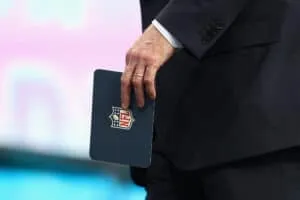 ARLINGTON, TX - APRIL 26: NFL Commissioner Roger Goodell holds a cue card during the first round of the 2018 NFL Draft at AT&T Stadium on April 26, 2018 in Arlington, Texas.