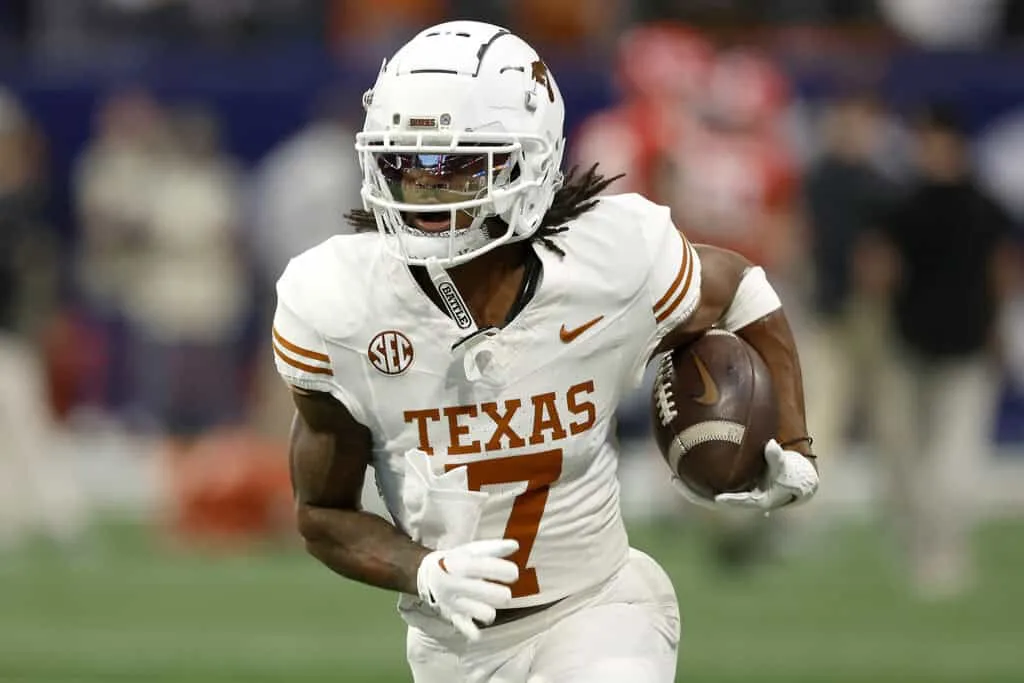 ATLANTA, GEORGIA - DECEMBER 07: Isaiah Bond #7 of the Texas Longhorns warms up prior to the 2024 SEC Championship against the Georgia Bulldogs at Mercedes-Benz Stadium on December 07, 2024 in Atlanta, Georgia.