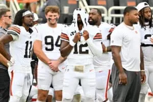 CLEVELAND, OHIO - AUGUST 23: Quarterback Shedeur Sanders #12 of the Cleveland Browns reacts after leaving the game during the fourth quarter of an NFL Preseason 2025 game against the Los Angeles Rams at Huntington Bank Field on August 23, 2025 in Cleveland, Ohio. The Browns defeated the Rams 19-17.