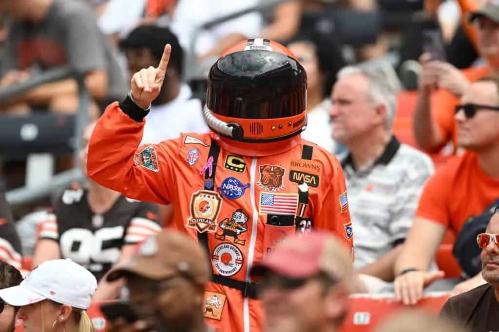 CLEVELAND, OHIO - AUGUST 23: A Cleveland Browns fan dressed as an astronaut poses for a photo during the first quarter of an NFL Preseason 2025 game against the Los Angeles Rams at Huntington Bank Field on August 23, 2025 in Cleveland, Ohio.