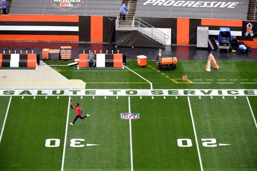 CLEVELAND, OHIO - NOVEMBER 15: A "Salute to Service" message is painted on the sideline as a Houston Texans player warms up prior to the game against the Cleveland Browns at FirstEnergy Stadium on November 15, 2020 in Cleveland, Ohio.