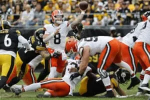 PITTSBURGH, PENNSYLVANIA - OCTOBER 12: Dillon Gabriel #8 of the Cleveland Browns throws under pressure from Nick Herbig #51 of the Pittsburgh Steelers during the first quarter in the game at Acrisure Stadium on October 12, 2025 in Pittsburgh, Pennsylvania.