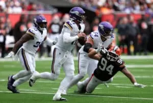LONDON, ENGLAND - OCTOBER 05: Carson Wentz of Minnesota Vikings looks to throw a pass during the second quarter in the NFL 2025 game between Minnesota Vikings and Cleveland Browns at Tottenham Hotspur Stadium on October 05, 2025 in London, England.""