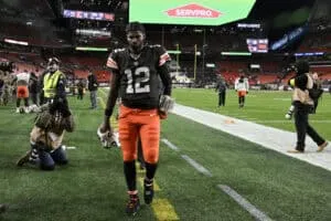CLEVELAND, OHIO - NOVEMBER 16: Shedeur Sanders #12 of the Cleveland Browns walks off the field after losing to the Baltimore Ravens 23-16 at Huntington Bank Field on November 16, 2025 in Cleveland, Ohio.