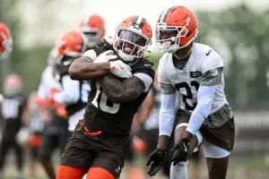 BEREA, OHIO - JUNE 04: Quinshon Judkins #10 and Denzel Ward #21 of the Cleveland Browns run a drill during Cleveland Browns OTA offseason workouts at CrossCountry Mortgage Campus on June 04, 2025 in Berea, Ohio.