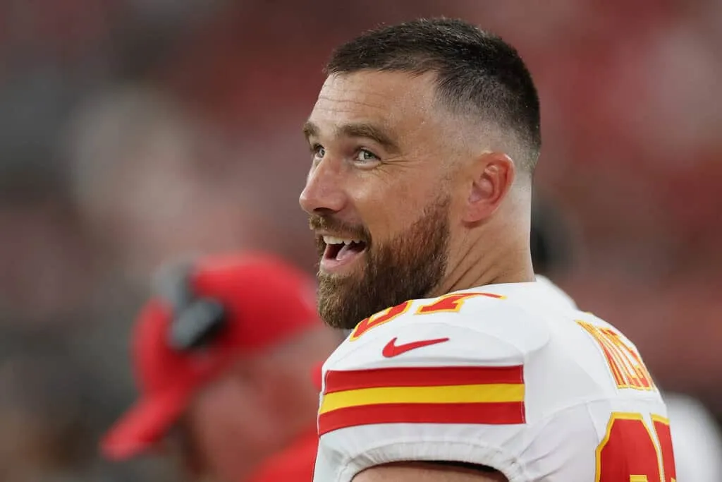 GLENDALE, ARIZONA - AUGUST 09: Tight end Travis Kelce #87 of the Kansas City Chiefs reacts on the sidelines during the first quarter of the NFL Preseason 2025 game against the Arizona Cardinals at State Farm Stadium on August 09, 2025 in Glendale, Arizona.