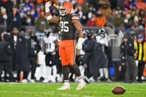 CLEVELAND, OHIO - NOVEMBER 16: Myles Garrett #95 of the Cleveland Browns gestures to the crowd during the second quarter against the Baltimore Ravens at Huntington Bank Field on November 16, 2025 in Cleveland, Ohio.