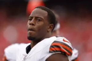 KANSAS CITY, MISSOURI - AUGUST 26: Nick Chubb #24 of the Cleveland Browns smiles during the second quarter on the sidelines of a preseason game against the Kansas City Chiefs at GEHA Field at Arrowhead Stadium on August 26, 2023 in Kansas City, Missouri.
