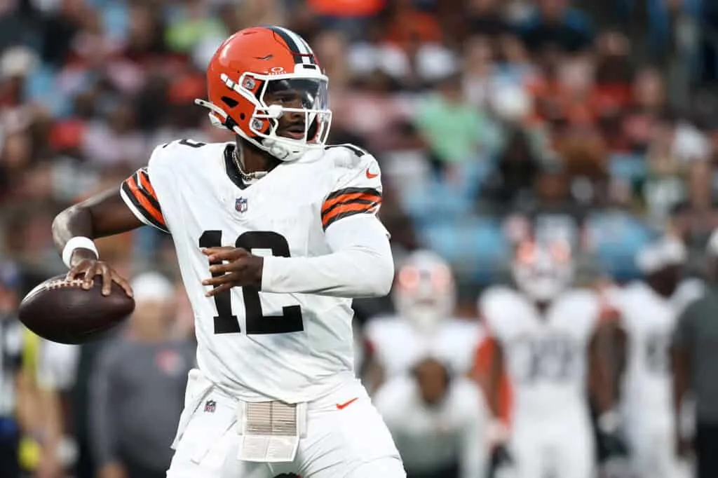 CHARLOTTE, NORTH CAROLINA - AUGUST 08: Quarterback Shedeur Sanders #12 of the Cleveland Browns drops to pass in the first half during the NFL Preseason 2025 game against the Carolina Panthers at Bank of America Stadium on August 08, 2025 in Charlotte, North Carolina.