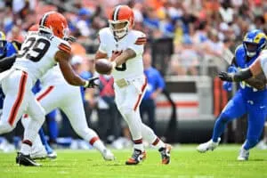 CLEVELAND, OHIO - AUGUST 23: Running back Ahmani Marshall #39 takes the hand off from quarterback Dillon Gabriel #5 of the Cleveland Browns during the first half of an NFL Preseason 2025 game against the Los Angeles Rams at Huntington Bank Field on August 23, 2025 in Cleveland, Ohio.