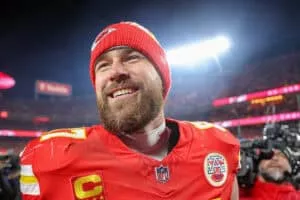 KANSAS CITY, MISSOURI - JANUARY 26: Travis Kelce #87 of the Kansas City Chiefs reacts after defeating the Buffalo Bills 32-29 in the AFC Championship Game at GEHA Field at Arrowhead Stadium on January 26, 2025 in Kansas City, Missouri.