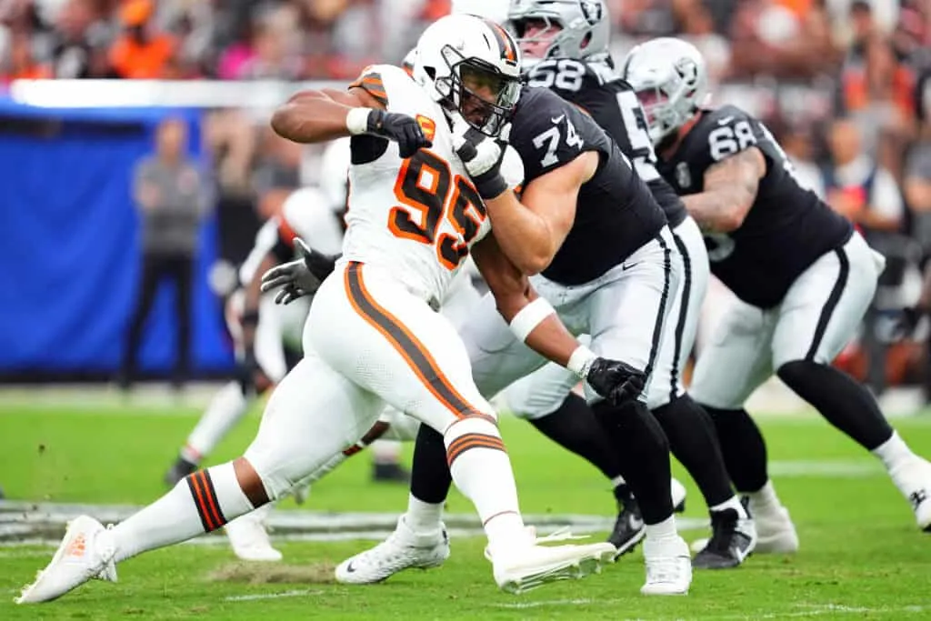 LAS VEGAS, NEVADA - SEPTEMBER 29: Myles Garrett #95 of the Cleveland Browns rushes against Kolton Miller #74 of the Las Vegas Raiders in the second quarter at Allegiant Stadium on September 29, 2024 in Las Vegas, Nevada.
