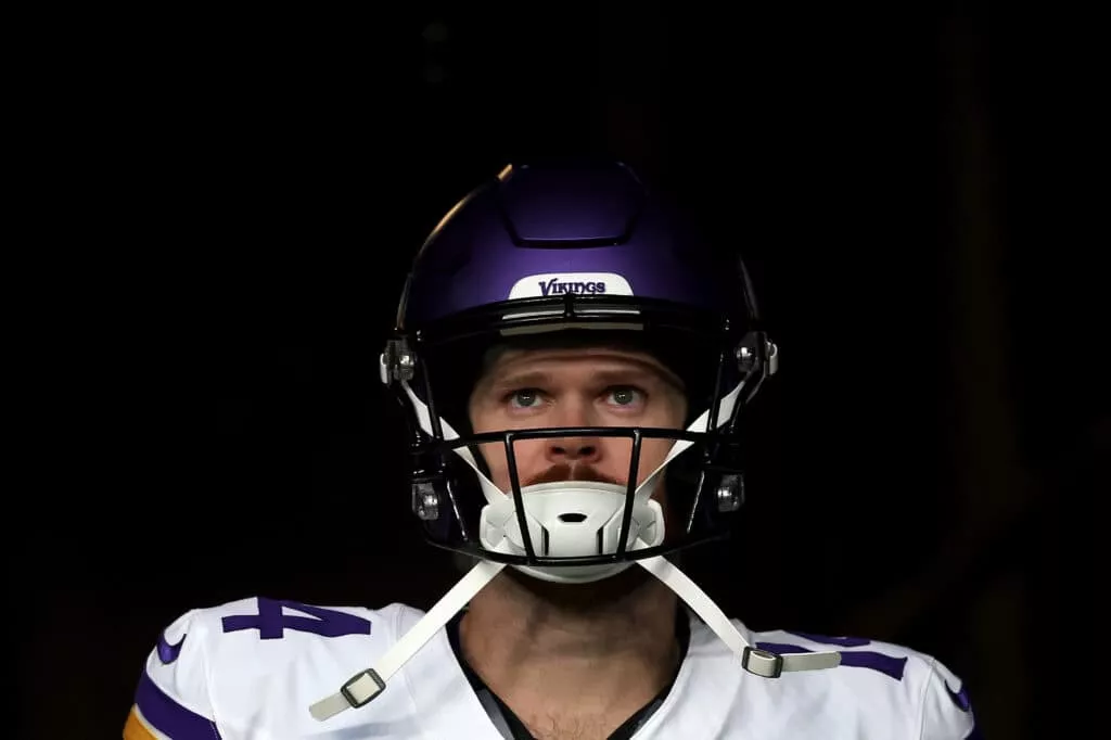 SEATTLE, WASHINGTON - DECEMBER 22: Sam Darnold #14 of the Minnesota Vikings looks on before the game Seahawks at Lumen Field on December 22, 2024 in Seattle, Washington.