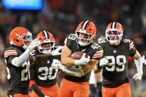 CLEVELAND, OHIO - NOVEMBER 16: Carson Schwesinger #49 of the Cleveland Browns celebrates an interception against the Baltimore Ravens during the third quarter at Huntington Bank Field on November 16, 2025 in Cleveland, Ohio.