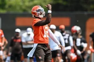 BEREA, OHIO - JUNE 04: Shedeur Sanders #12 of the Cleveland Browns celebrates during Cleveland Browns OTA offseason workouts at CrossCountry Mortgage Campus on June 04, 2025 in Berea, Ohio.