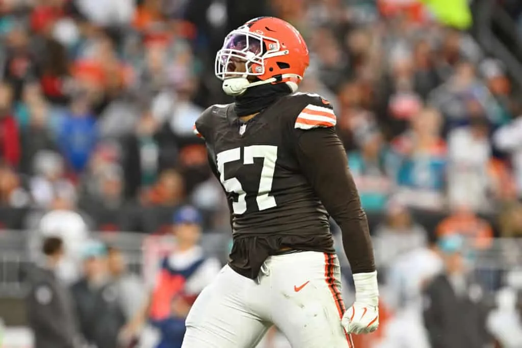 CLEVELAND, OHIO - DECEMBER 29: Isaiah McGuire #57 of the Cleveland Browns reacts during the second quarter against the Miami Dolphins at Huntington Bank Field on December 29, 2024 in Cleveland, Ohio.