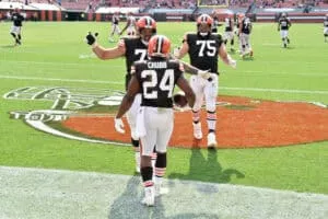 CLEVELAND, OHIO - SEPTEMBER 27: Offensive tackle Jack Conklin #78 and offensive guard Joel Bitonio #75 of the Cleveland Browns celebrate with running back Nick Chubb #24 of the Cleveland Browns after Chubb ran for a touchdown against the Washington Football Team during the fourth quarter at FirstEnergy Stadium on September 27, 2020 in Cleveland, Ohio. The Browns defeated the Washington Football Team 34-20.