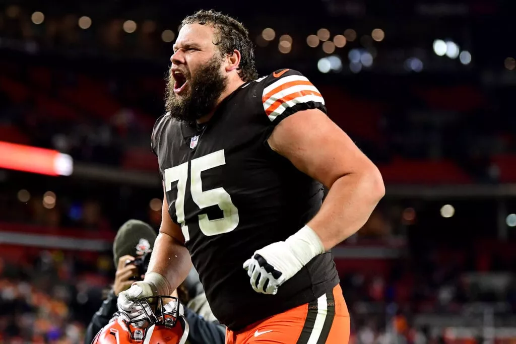 CLEVELAND, OHIO - OCTOBER 21: Guard Joel Bitonio #75 of the Cleveland Browns celebrates the Browns win over the Denver Broncos at FirstEnergy Stadium on October 21, 2021 in Cleveland, Ohio.