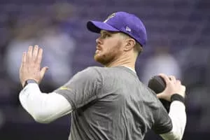 MINNEAPOLIS, MINNESOTA - DECEMBER 29: Sam Darnold #14 of the Minnesota Vikings warms up prior to a game against the Green Bay Packers at U.S. Bank Stadium on December 29, 2024 in Minneapolis, Minnesota.