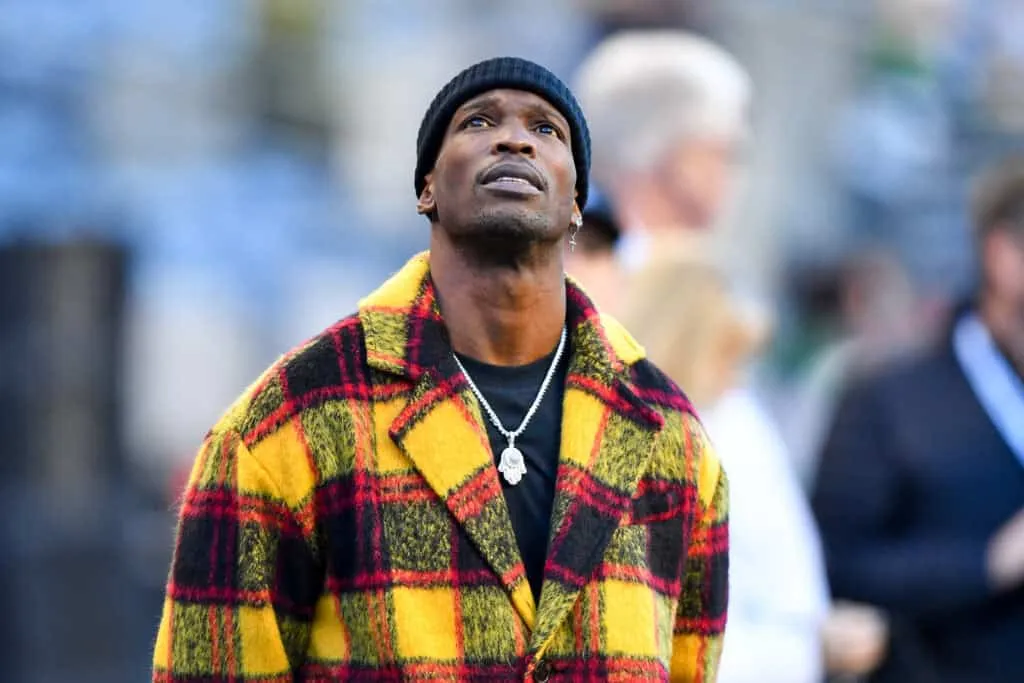 SEATTLE, WASHINGTON - DECEMBER 29: Former NFL wide receiver Chad Johnson looks at the scoreboard before the game between the Seattle Seahawks and the San Francisco 49ers at CenturyLink Field on December 29, 2019 in Seattle, Washington.