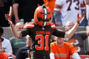 CLEVELAND, OH - SEPTEMBER 27: A Cleveland Browns fan cheers during the first quarter against the Oakland Raiders at FirstEnergy Stadium on September 27, 2015 in Cleveland, Ohio.