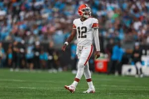 CHARLOTTE, NORTH CAROLINA - AUGUST 08: Shedeur Sanders #12 of the Cleveland Browns looks on during the first half of an NFL Preseason 2025 game against the Carolina Panthers at Bank of America Stadium on August 08, 2025 in Charlotte, North Carolina.