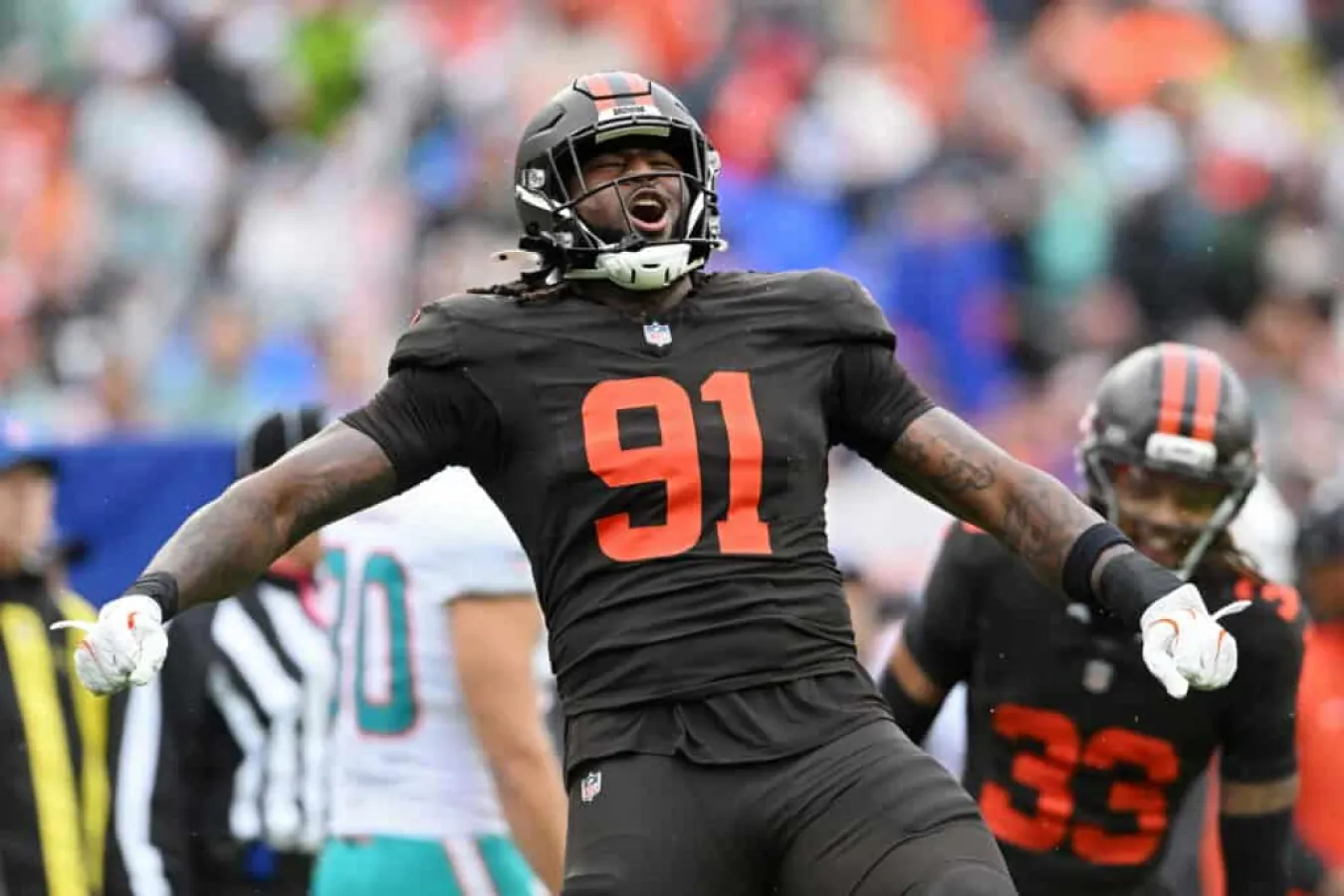 CLEVELAND, OHIO - OCTOBER 19: Alex Wright #91 of the Cleveland Browns celebrates after a play against the Miami Dolphins in the game at Huntington Bank Field on October 19, 2025 in Cleveland, Ohio.